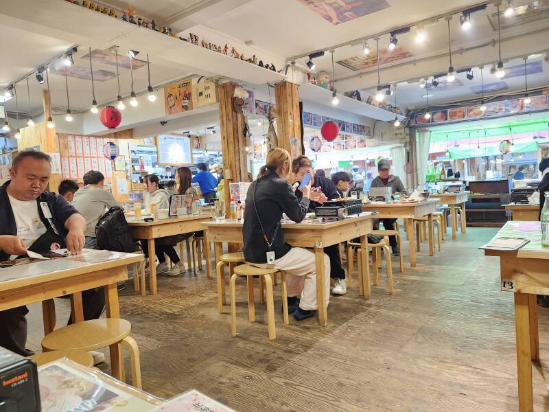 Interior of nice seafood restaurant in the morning market.