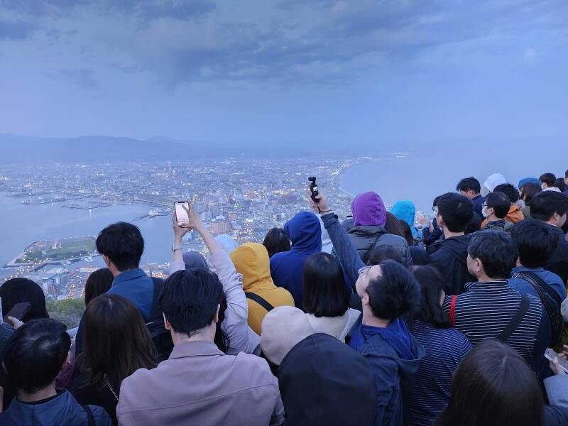 Crowd of people on the summit of Mount Hakodate