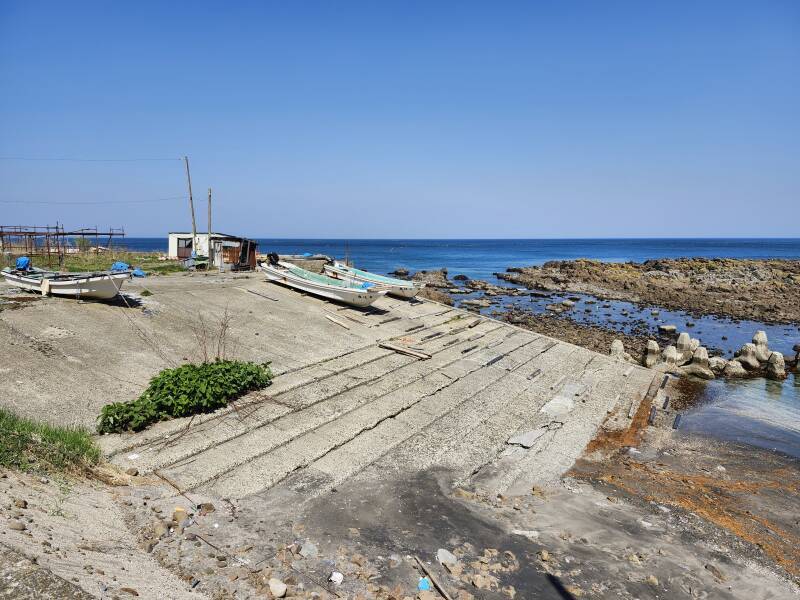 Boats on a ramp ready to be launched.