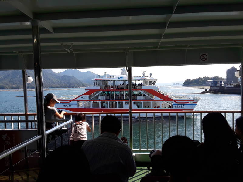 Ferry ride to Itsukushima Shrine.