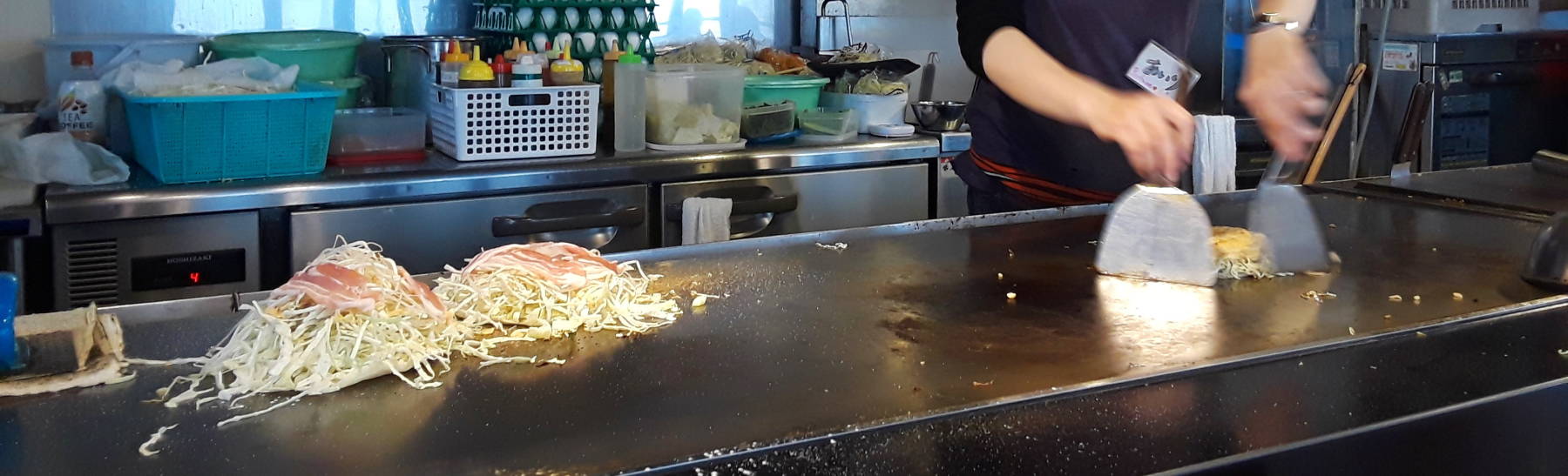 An okonomiyaki chef works her magic in Hiroshima.