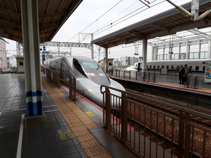 Shinkansen arrives at Okayama Station.