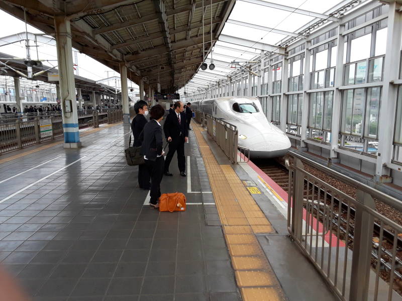 Shinkansen arrives at Okayama Station.