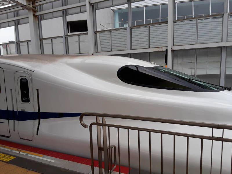 Shinkansen arrives at Okayama Station.