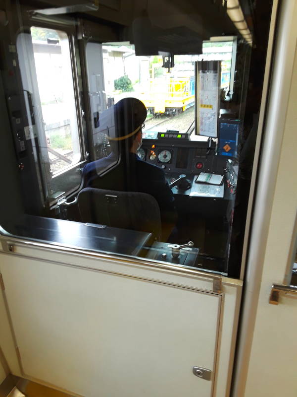 Engineer drives the locomotive on the JR Line local train.