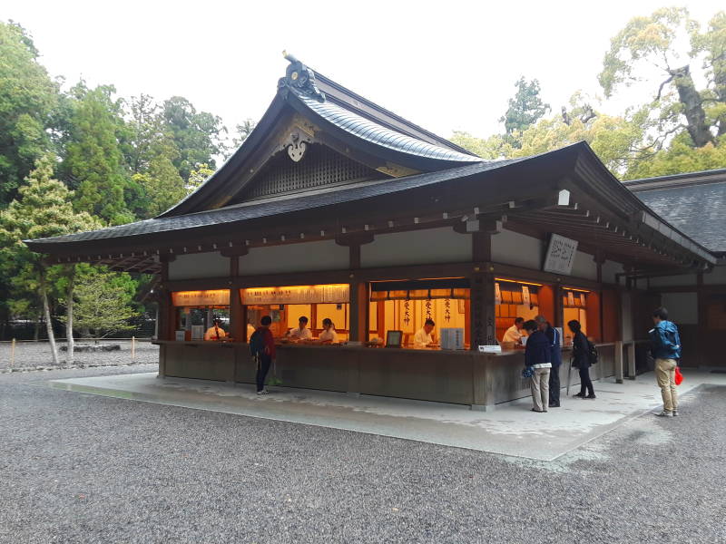 Calligraphers create wooden plaques for visitors to the Outer Shrine at Ise.