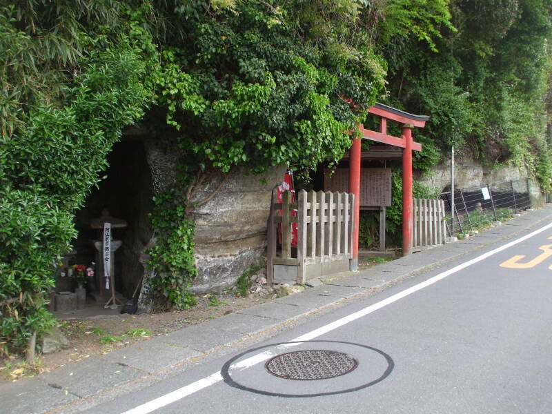 Yagura or rock-carved samurai tombs and a small Shintō shrine in Kamakura.