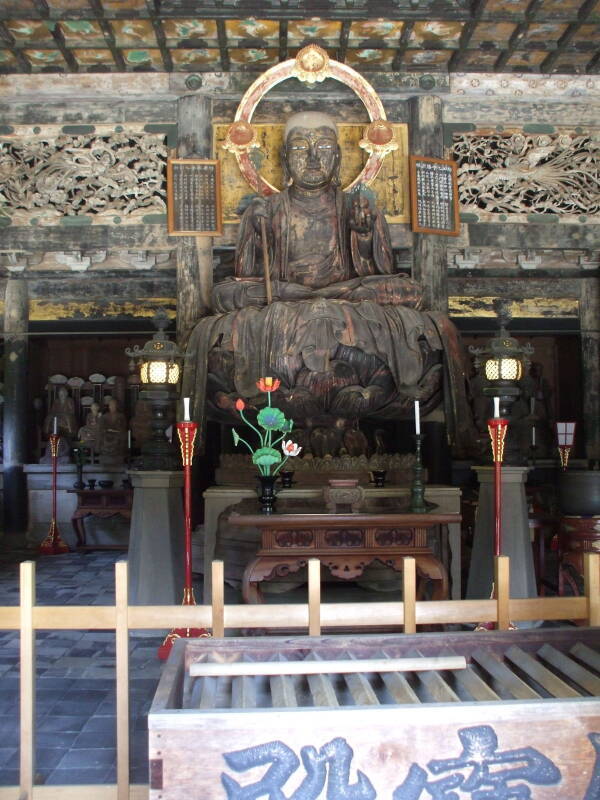 Buddha in the Butsuden at Zen Buddhist temple Kenchō-ji at Yamanouchi near Kamakura.
