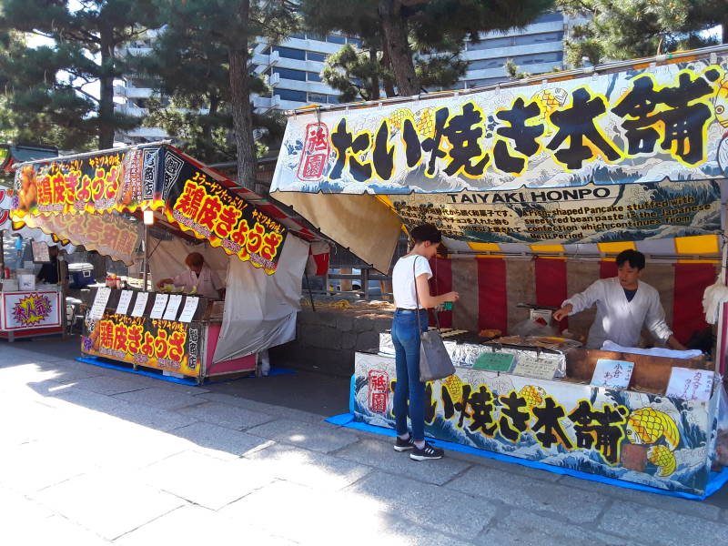 Vendor booths outside Fushimi Inari-taisha shrine.