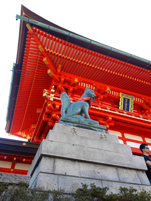 Fox guardian at main gate at Fushimi Inari-taisha shrine.