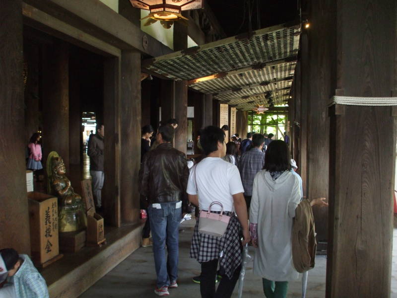 Entering the main temple at Kiyomizu-dera.