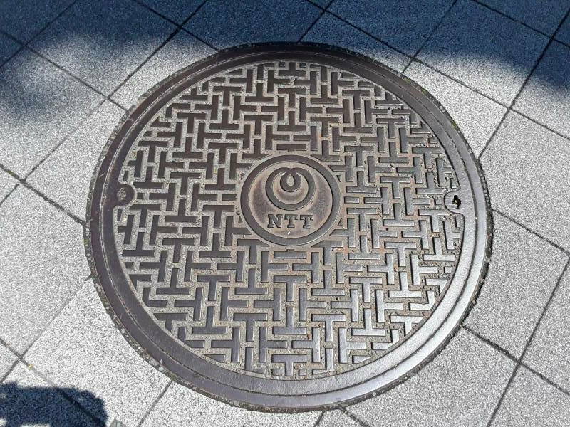 Standardized NTT manhole cover in Kyōto.