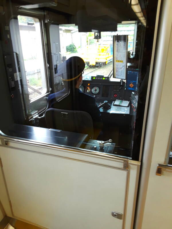 Train driver in a local train at Ise.