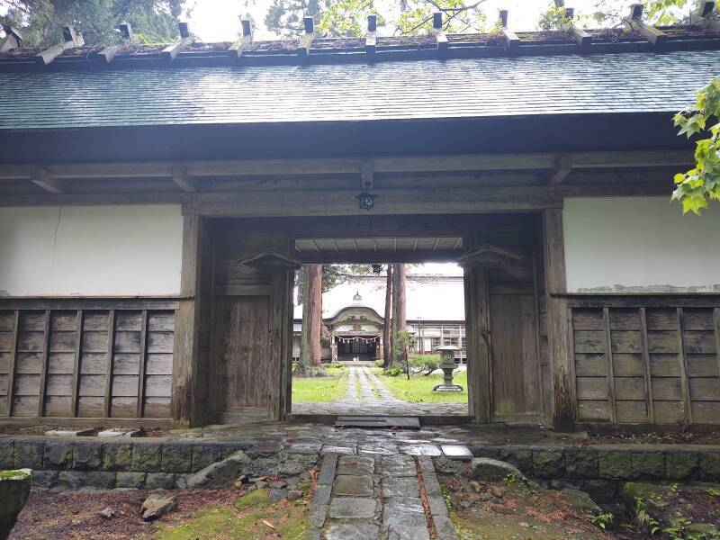 Gate at the entrance to the Saikan pilgrim lodge.