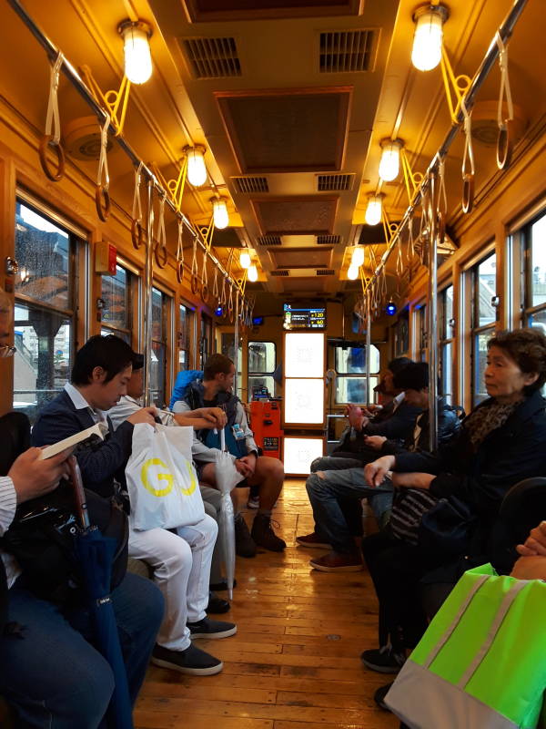 On board the streetcar in Nagasaki.