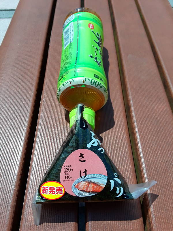 Salmon o-nigiri and green tea in Nagasaki.