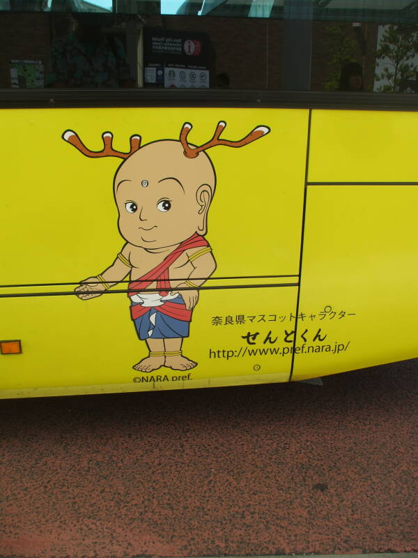 Buddhist monk with antlers.