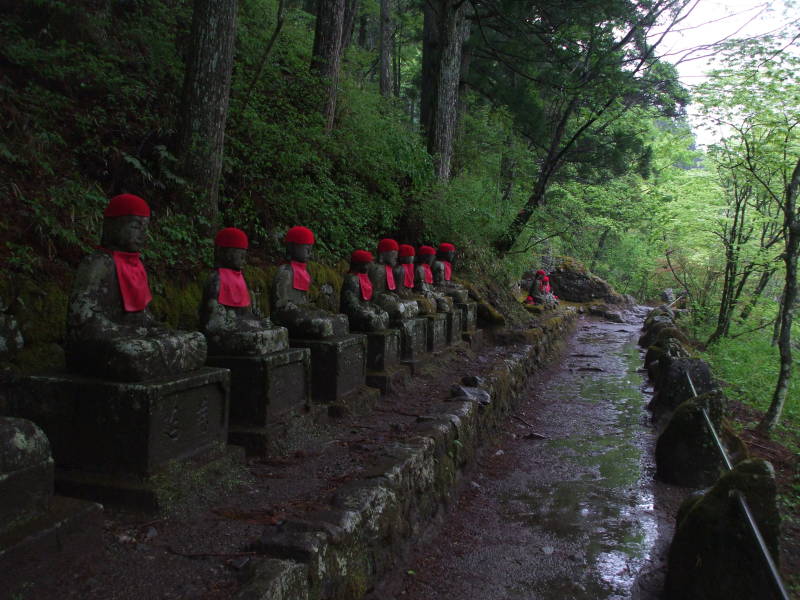 Long line of Jizō statues in the Kanman-ga-fuchi abyss outside Nikkō.