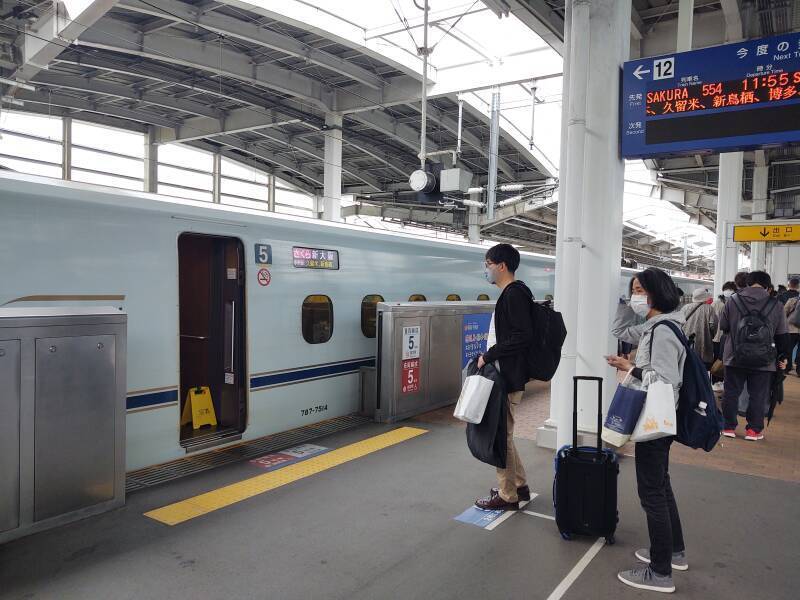 Preparing to board a Kyūshū Shinkansen at the platform at Kagoshima Chūō station.