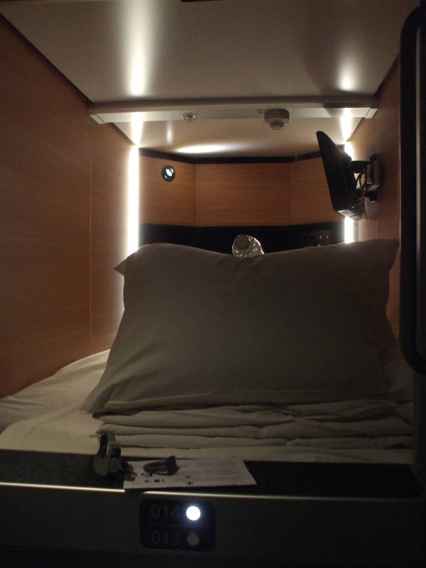 Sleeping capsules in a capsule hotel.