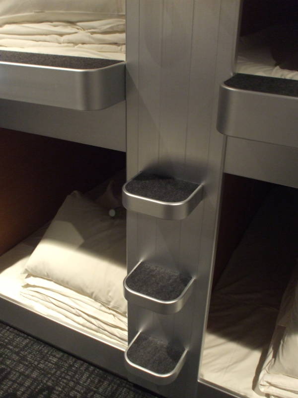 Sleeping capsules in a capsule hotel.