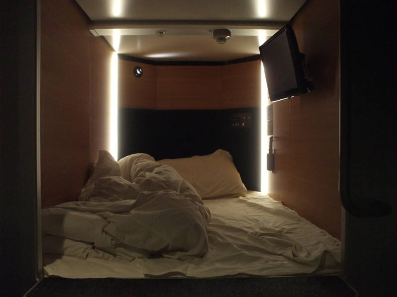 Sleeping capsules in a capsule hotel.