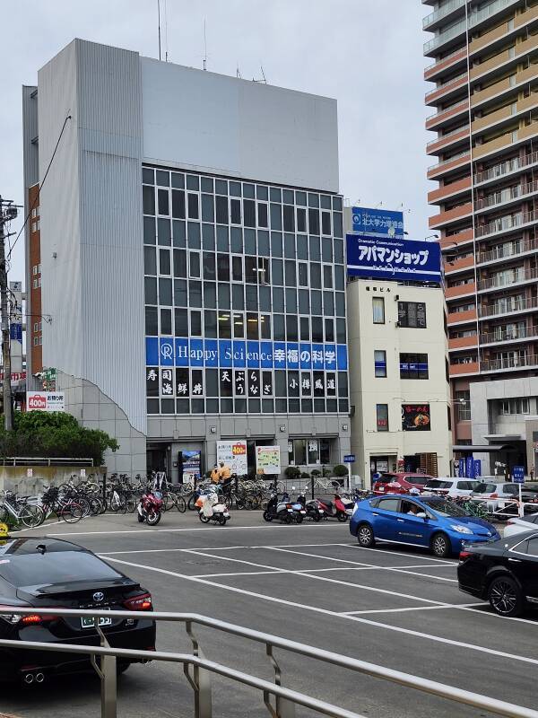 Happy Science office across the lot from Otaru Station.