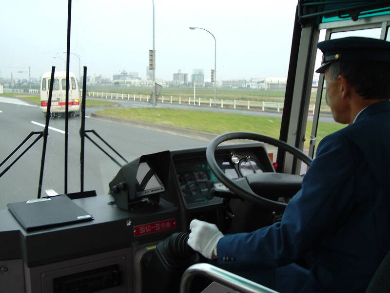 Japanese bus drivers wear white gloves.