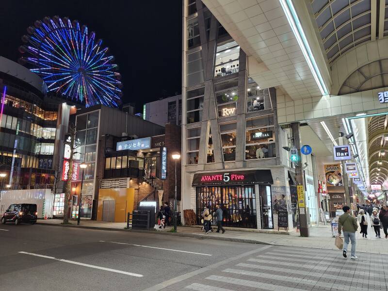 Tanukikoji, large lighted wheel over Susukino entertainment district.