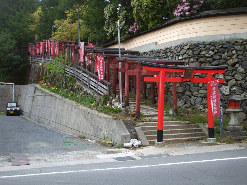 Long series of torii or sacred gates leading to Kiyotaka Inari shrine in Kōyasan.