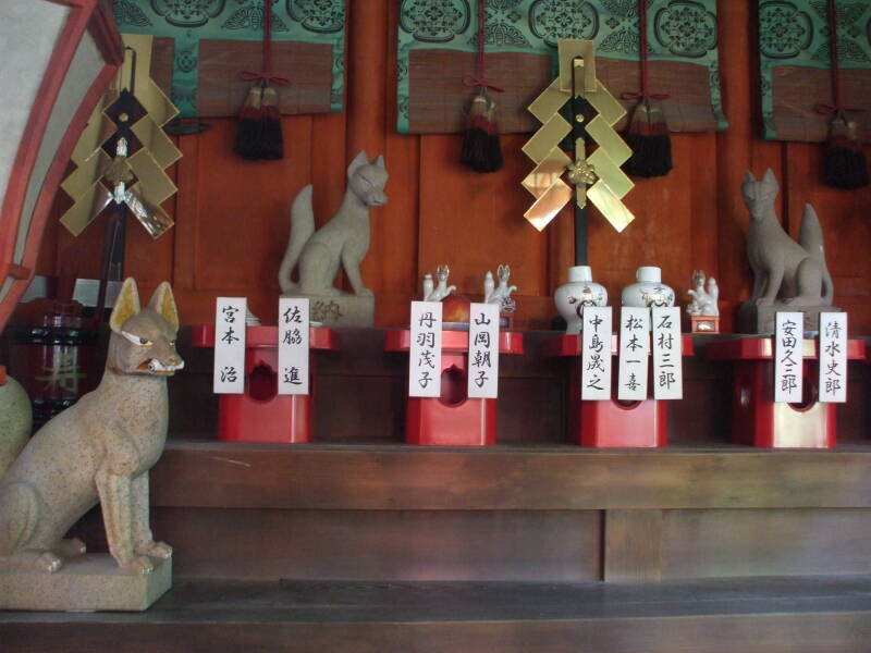 Fox guardians at Okazaki Shintō shrine in Kyōto.