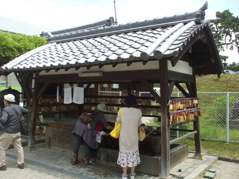 Ablution fountain, hand-washing basin at Kofuku-ji in Nara.