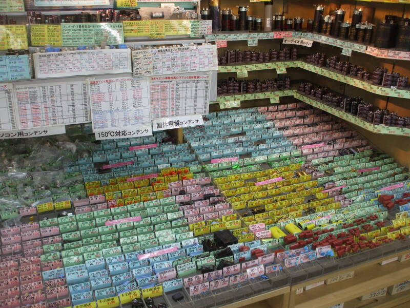 Electronics shop selling nothing but capacitors in narrow indoor passageways in Akihabara.