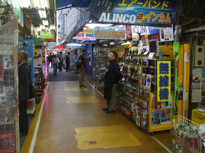 Electronics shops in narrow indoor passageways in Akihabara.