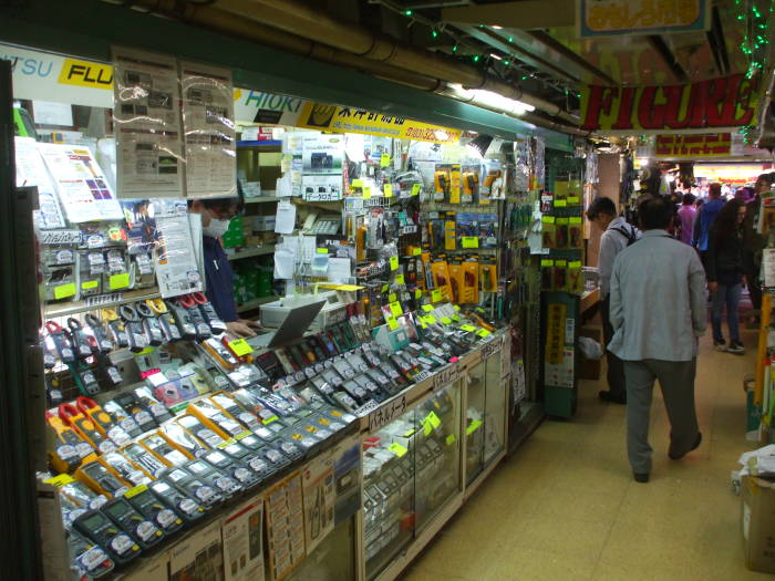 Electronics shops in narrow indoor passageways in Akihabara.
