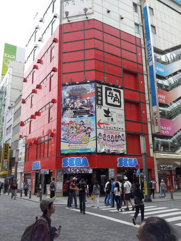 Exiting the south end of Akihabara Station, toward a multi-story Sega store.