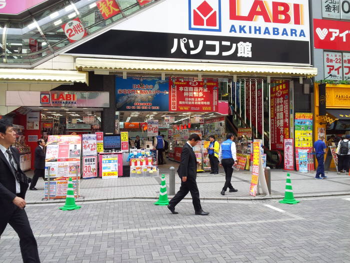 Salarymen walk along the south end of Akihabara Station.