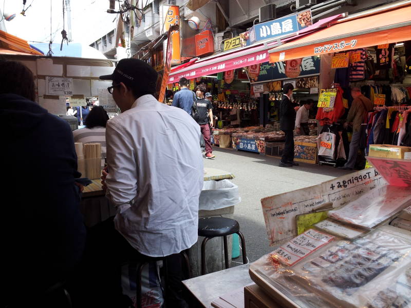 My seat at a small restaurant in the Ameya-Yokochō market under the Yamanote Line tracks.