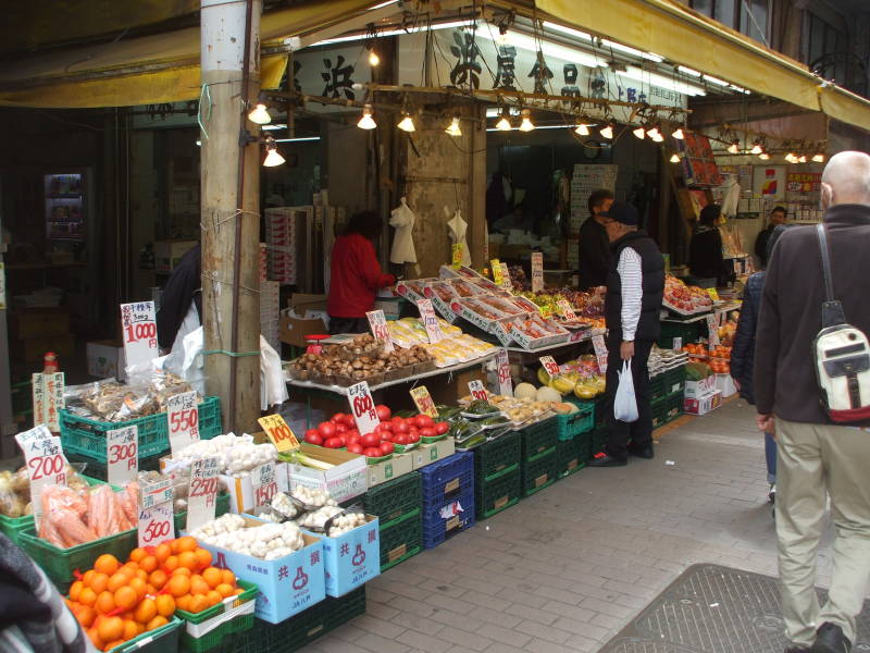 Fruits and vegetables for sale in the Ameya-Yokochō market under the Yamanote Line tracks.