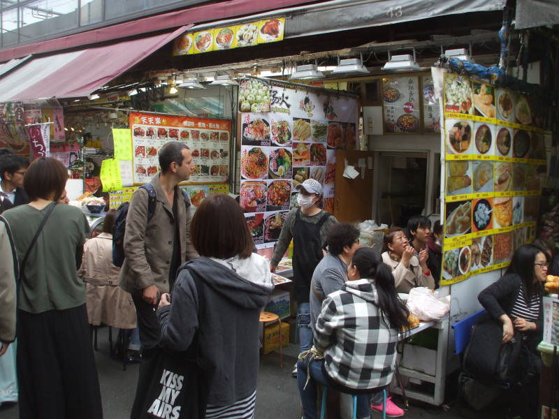 Small restaurants in the Ameya-Yokochō market under the Yamanote Line tracks.