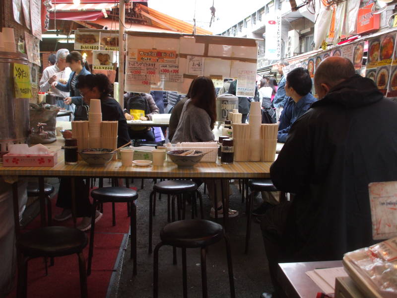 Other diners at a small restaurant in the Ameya-Yokochō market under the Yamanote Line tracks.