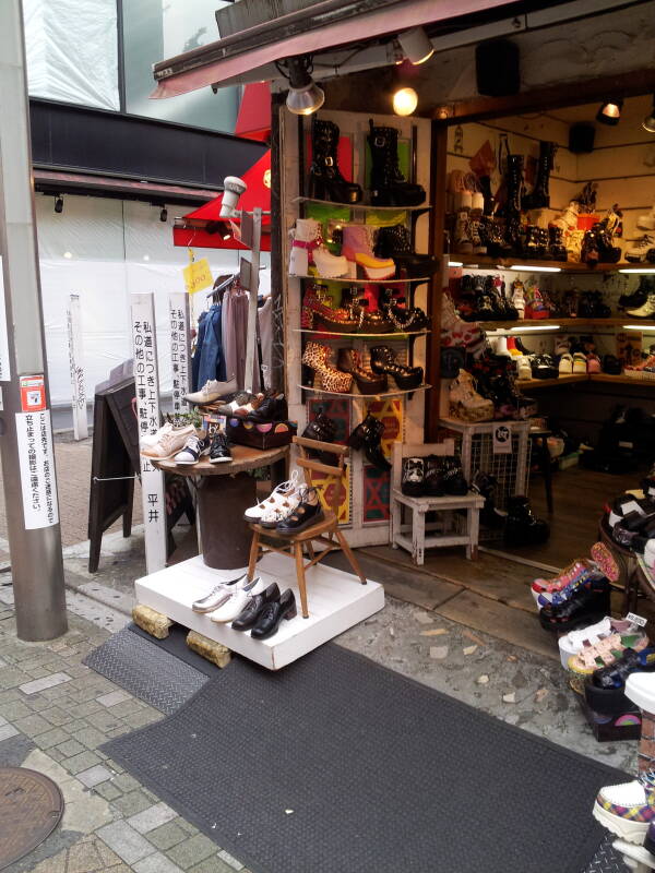 Shoes and boots in a shop on Takeshita-dori or Takeshita Street in Harajuku.