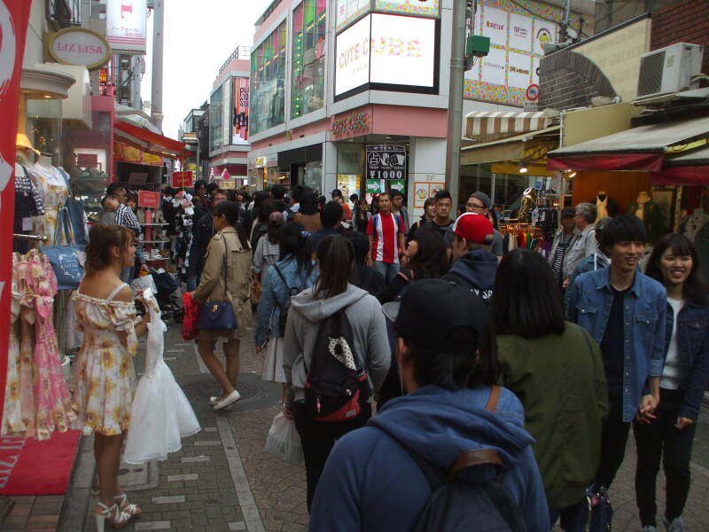 Girl promoting a clothing shop on Takeshita-dori or Takeshita Street in Harajuku.
