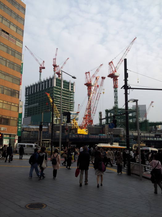 Construction cranes in Shibuya.