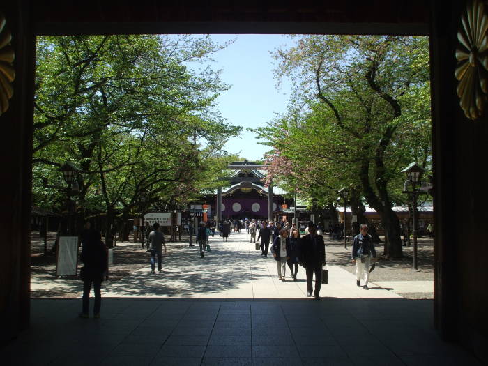Passing through the gateway at the Yasukuni Shrine.