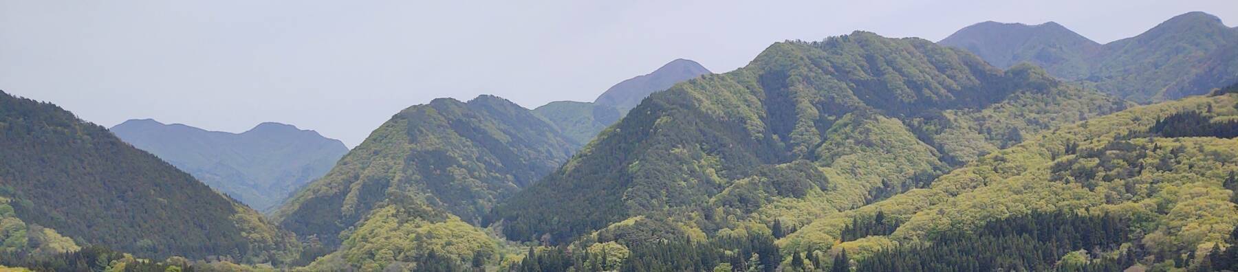 View over the mountain valleys from a rock outcropping at Shiro-iwa Nana-iwa at Minenoura, near Yamadera.