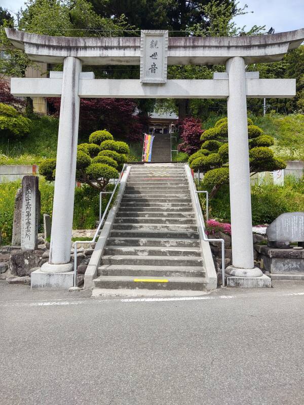 Approaching Senjuin Kannon-dō through a torii.