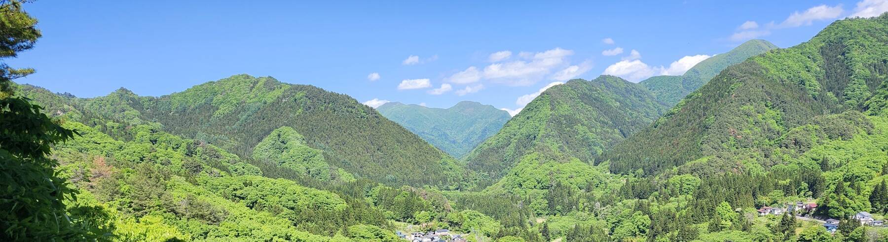 View over the mountain valleys from a rock outcropping at Shiro-iwa Nana-iwa at Minenoura, near Yamadera.