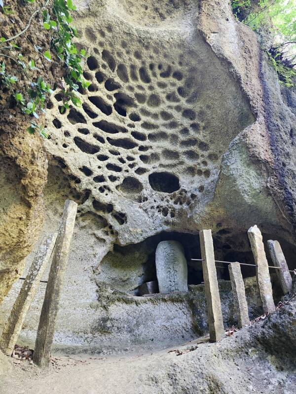 Buddhist shrines in the strangely eroded cliff faces at the Tarumizu ruins.