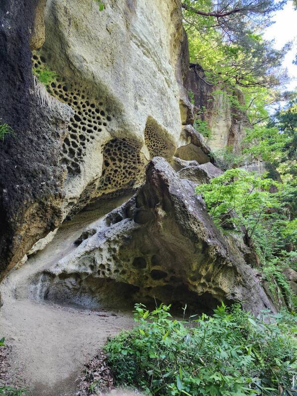 Strangely eroded cliff faces at the Tarumizu ruins.